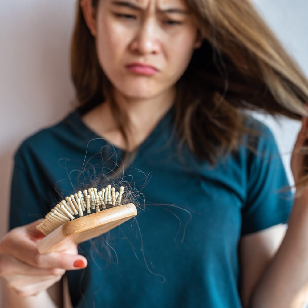 istock-1313033888-female-hair-loss-hair-visions-international